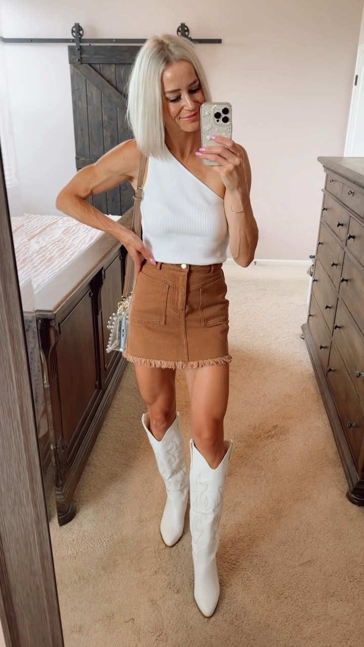 I love this little one shoulder tank and cutie skirt! Throw on your favorite boots and grab your clear purse and you are ready for your next concert.
#concert 

#LTKstyletip #LTKfindsunder50