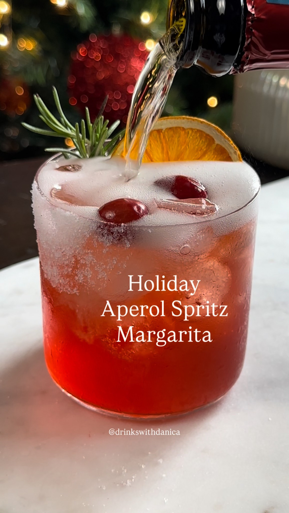 Holiday Aperol Spritz Margarita 

Follow me on Instagram and TikTok @drinkswithdanica for this recipe and more. Full recipe can also be found at www.drinkswithdanica.com 