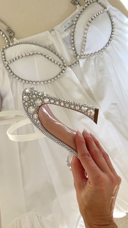 The @Saks friends & family sale starts today and there are endless chic options for your next special event. Sharing lots more favorites on my stories and LTK today.

Area white mini dress with rhinestones. Fits slightly small. These epic embellished heels fit true to size and so light and airy  

#LTKwedding #LTKsalealert #LTKshoecrush