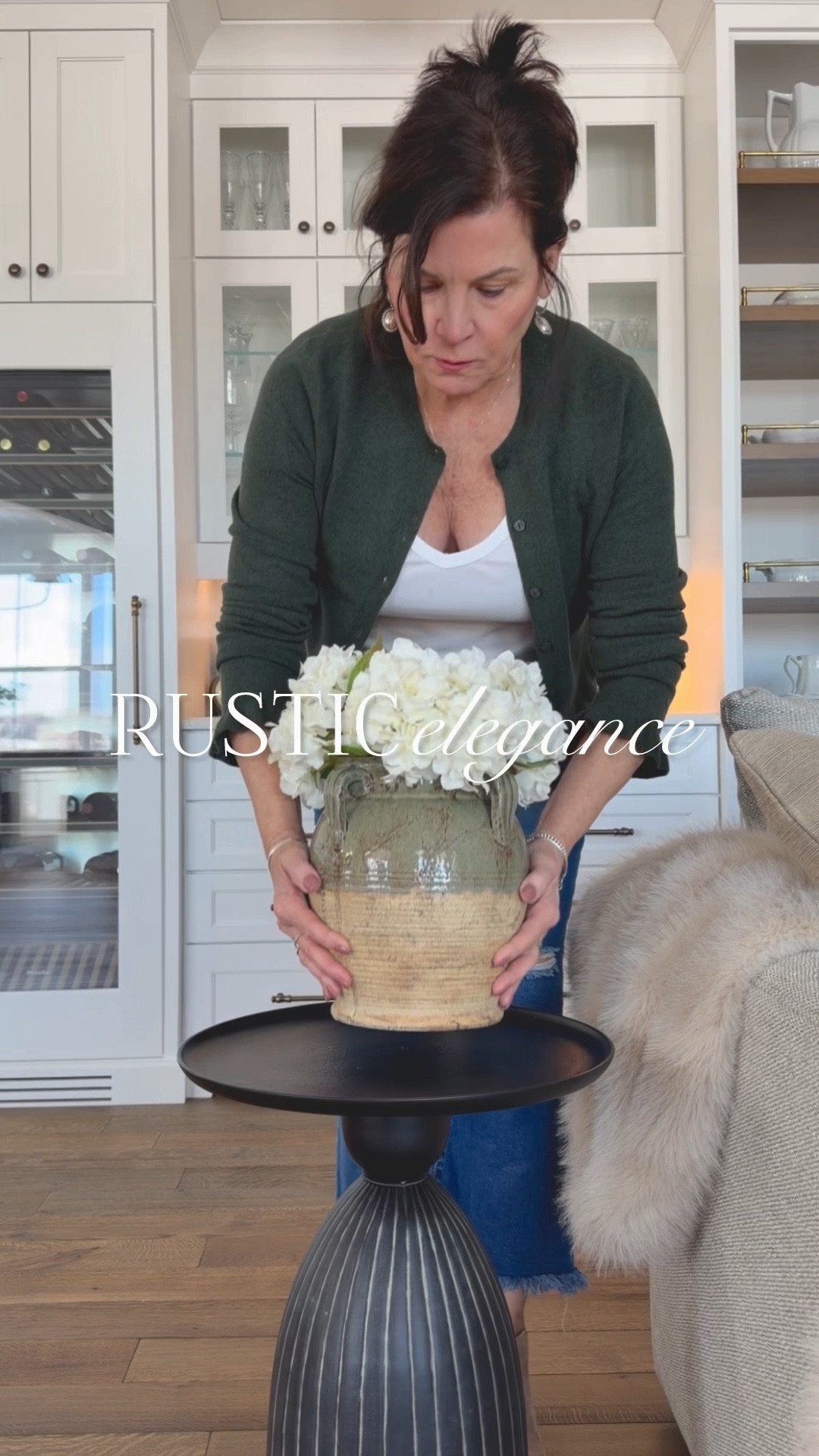 In my home, you will see rustic elements combined with more refined items to create a cozy, welcoming, lived-in feel. 

For example, use rustic vases with classic flowers, or a vintage bowl on your table with an elegant light. 

My table vase and large bowl are vintage finds  

#LTKHome #LTKSeasonal #LTKvlog