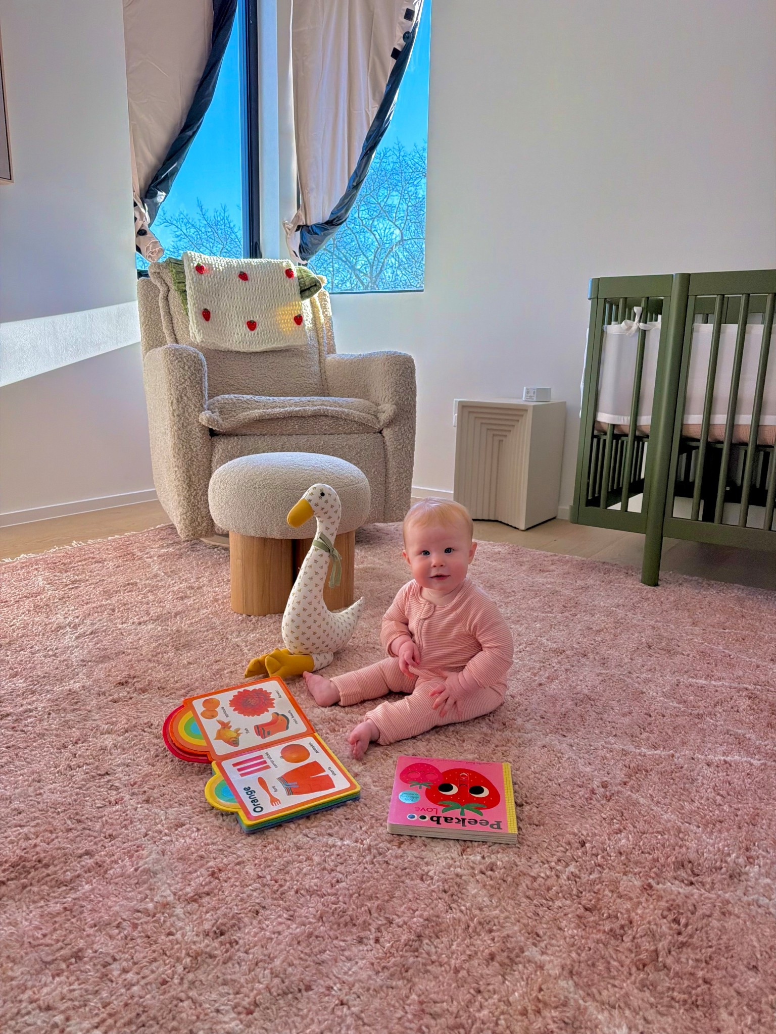 So happy with this soft pink rug for our nursery!
