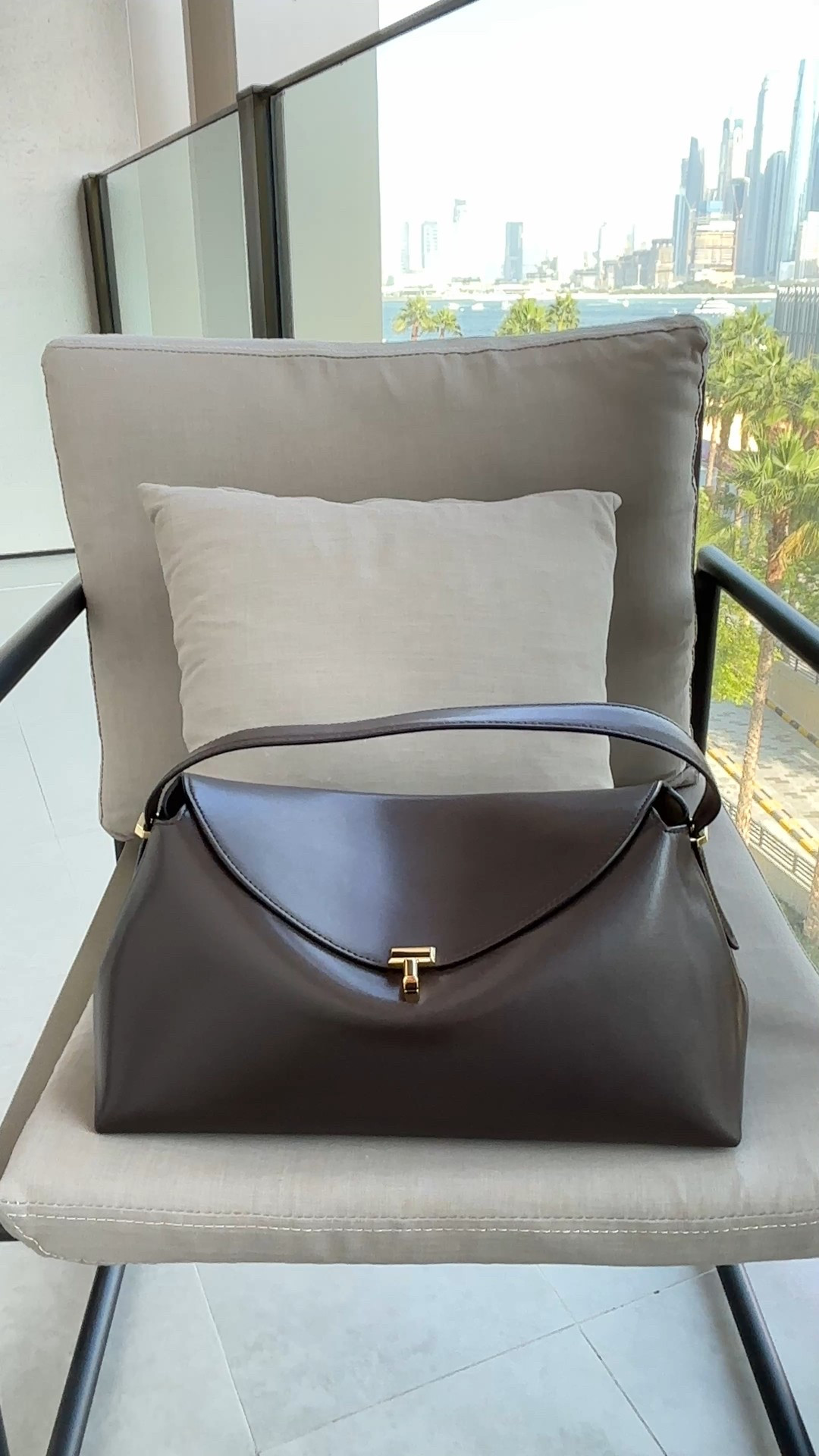 Toteme chocolate brown T-Lock bag 

#LTKbag #LTKuk #LTKwinter