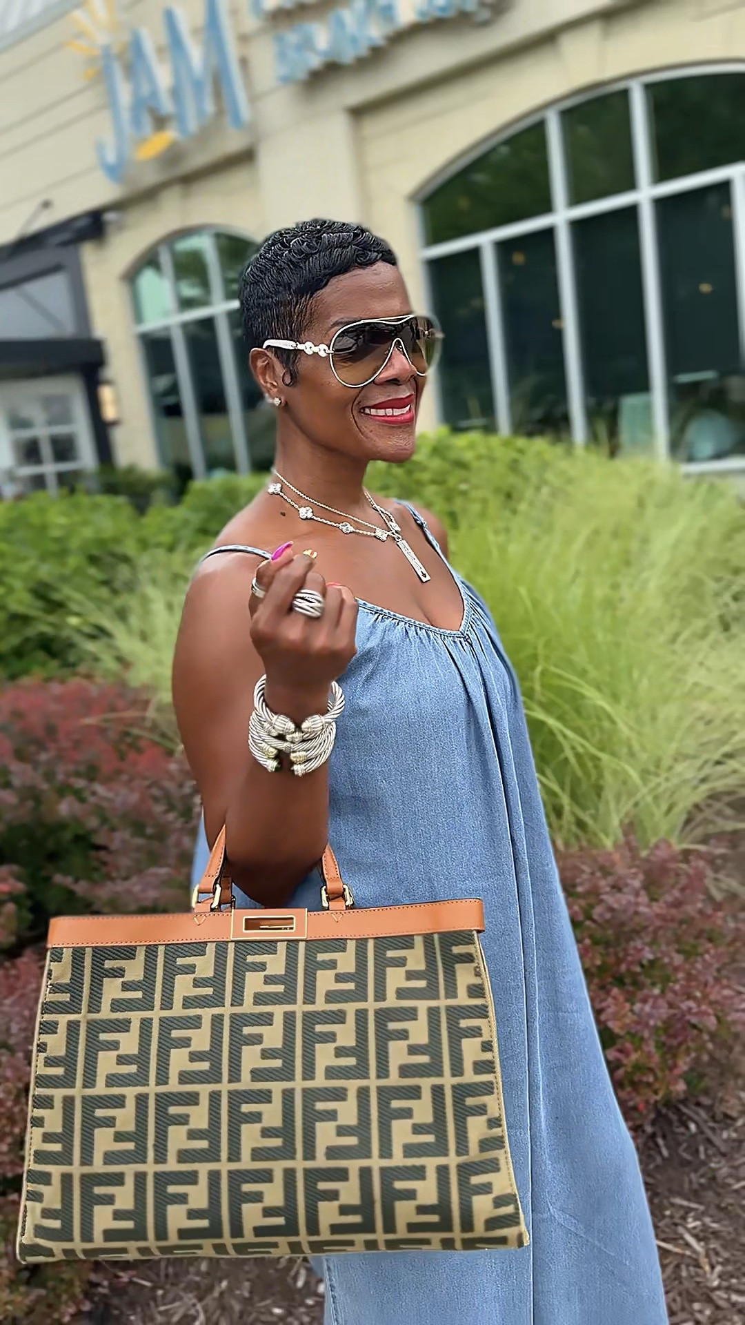 Casual never has to mean boring. 💙
An easy denim jumpsuit, stacked accessories, and a statement tote are all it takes. Effortless style is always in season. ✨ Shop the look!

#LTKootd #LTKgrwm #LTKOver40