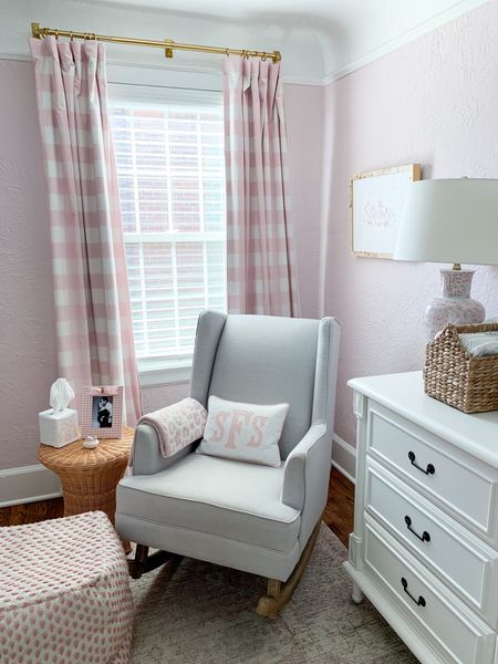 Light pink baby girl nursery- one of my favorite spaces in our home!  I love sitting on this rocker- and we use this every night two years later. I also adore her pink gingham curtains. They really make the room!

#LTKfindsunder100 #LTKbaby #LTKhome