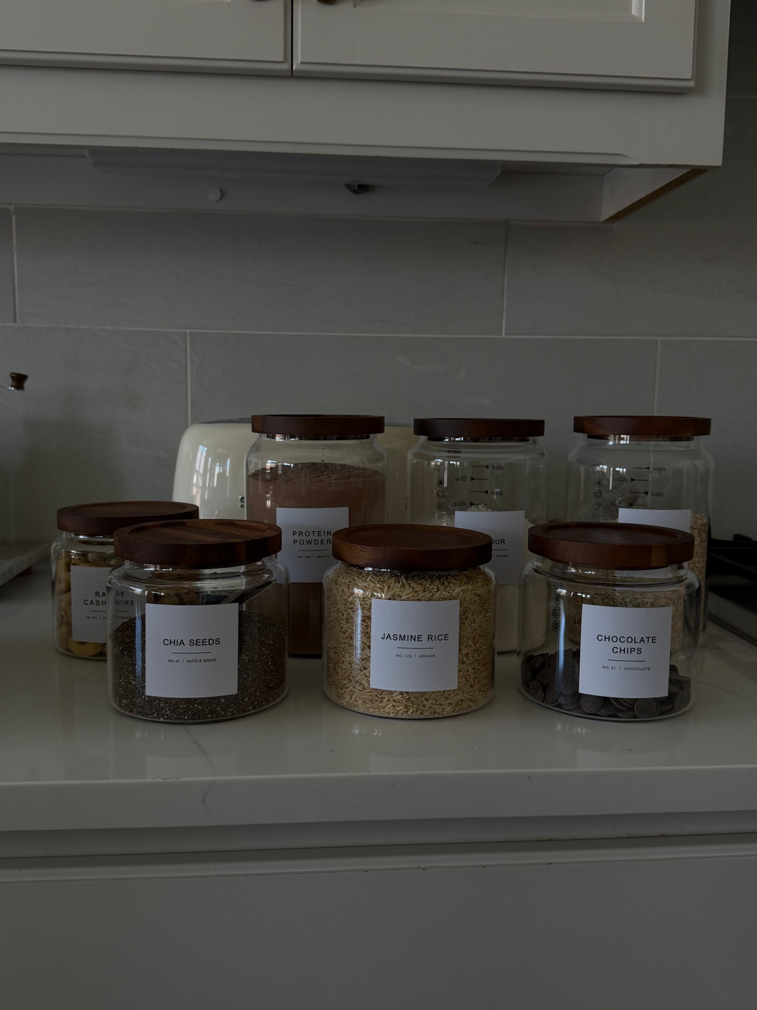 Pantry organization - fall kitchen - glass jars - wooden lids 

#LTKSeasonal #LTKSaleAlert #LTKHome
