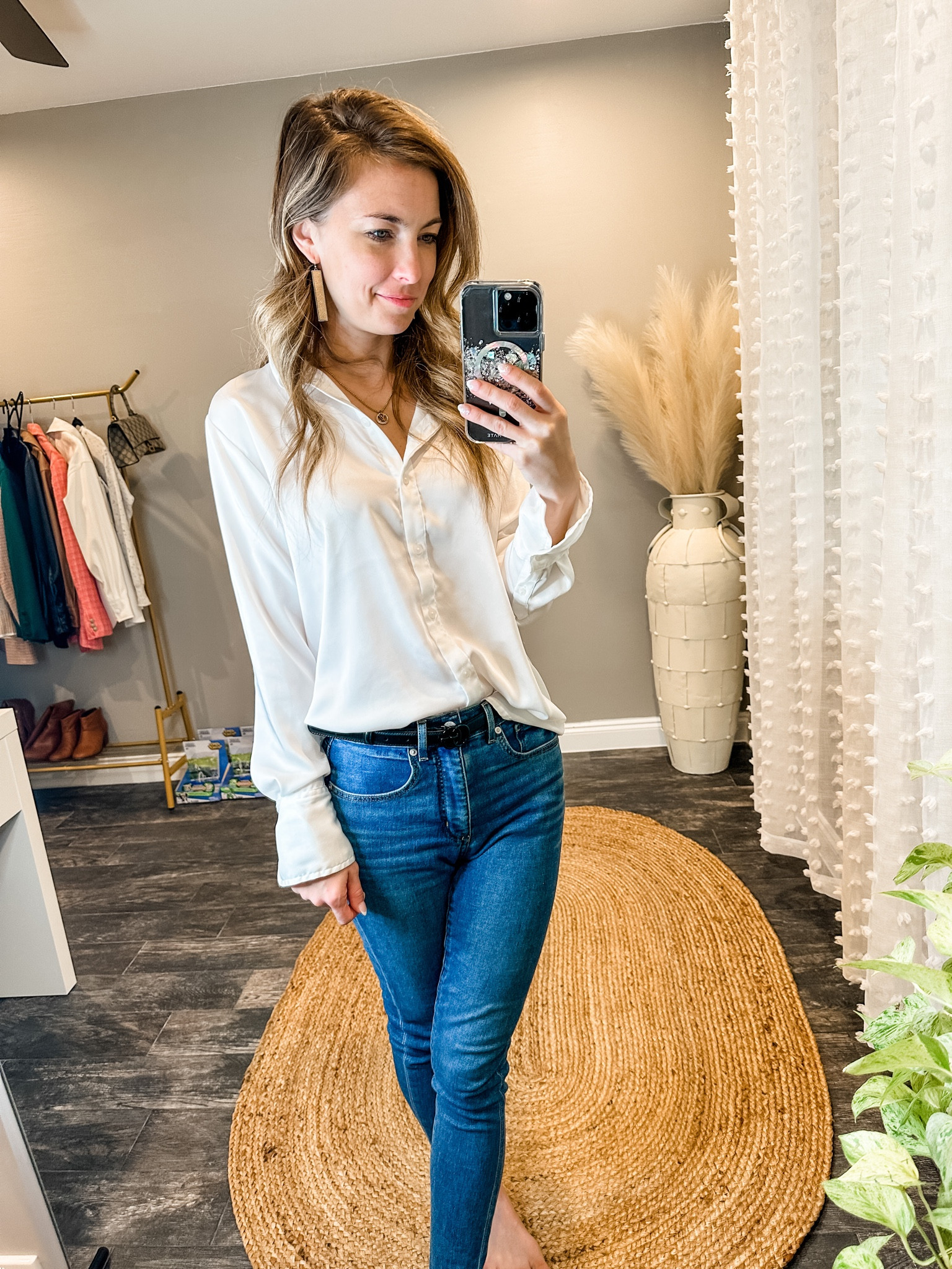 Not your basic white button up shirt! Impossible to show in a photo, but it has a very good quality satin type of material that is like a non-wrinkle. I wasn’t expecting to like the shirt as much as I did. I kind of thought that I would be taking it back honestly. Really great staple button up to wear under a blazer or a sweater or just casually with some jeans. It has a little bit of stretch. The sleeve cuffs are unique. Just a very well thought out shirt for $25. It’s a deal.

Oh! But it is definitely a loose fit. This is an XS on me..size down if you want a more fitted feel

#LTKworkwear #LTKstyletip #LTKunder100