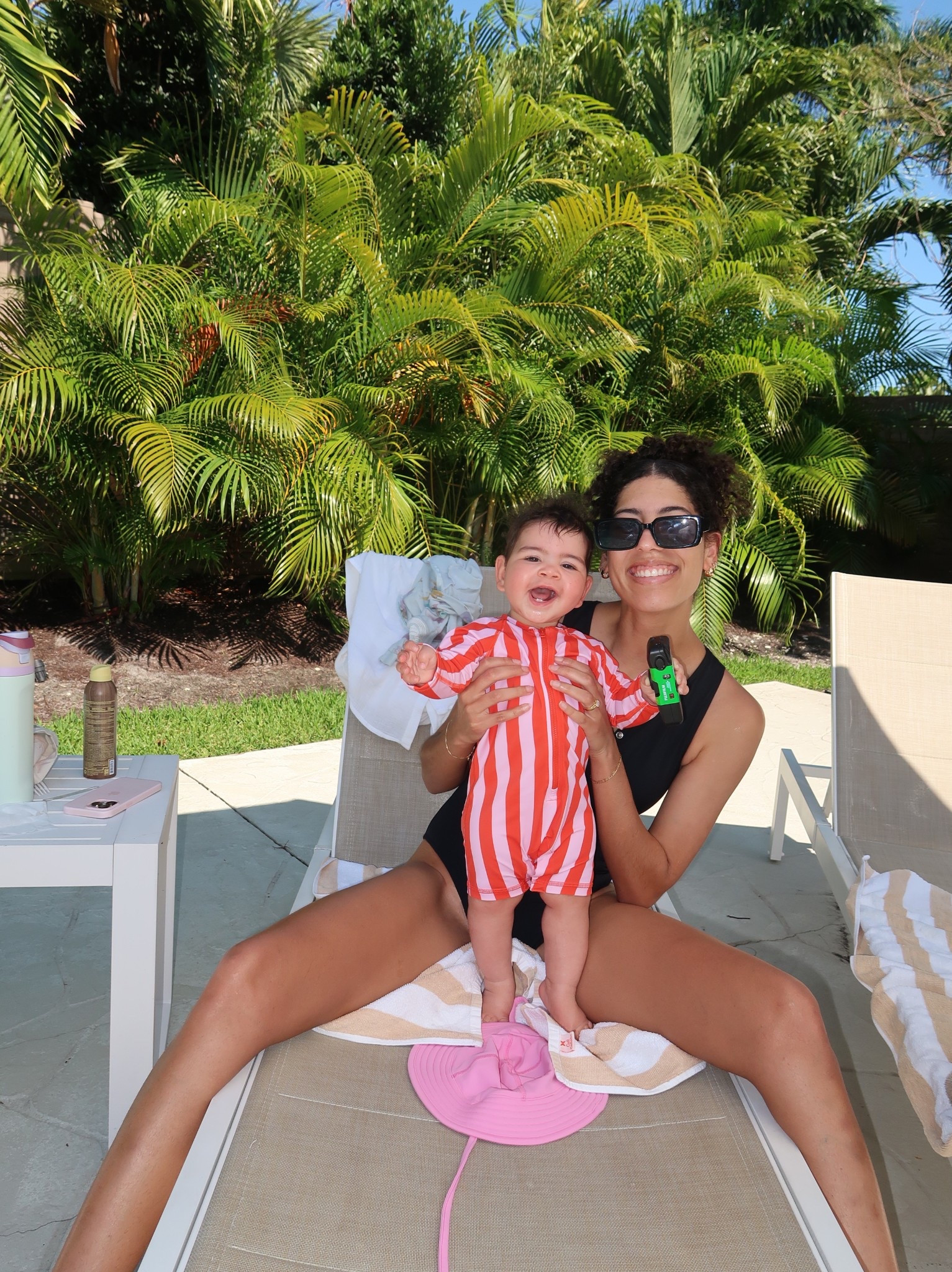 smiles + splashes ⛱️
black mom one piece - andie swim 
Baby swimsuit - Hanna andersson