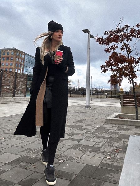 Fall winter commute outfit, rights with skirt, Long wool coat with beanie, short skirt long jacket, tall beanie, golden goose sneakers and skirt 

#LTKfindsunder50 #LTKSeasonal #LTKworkwear