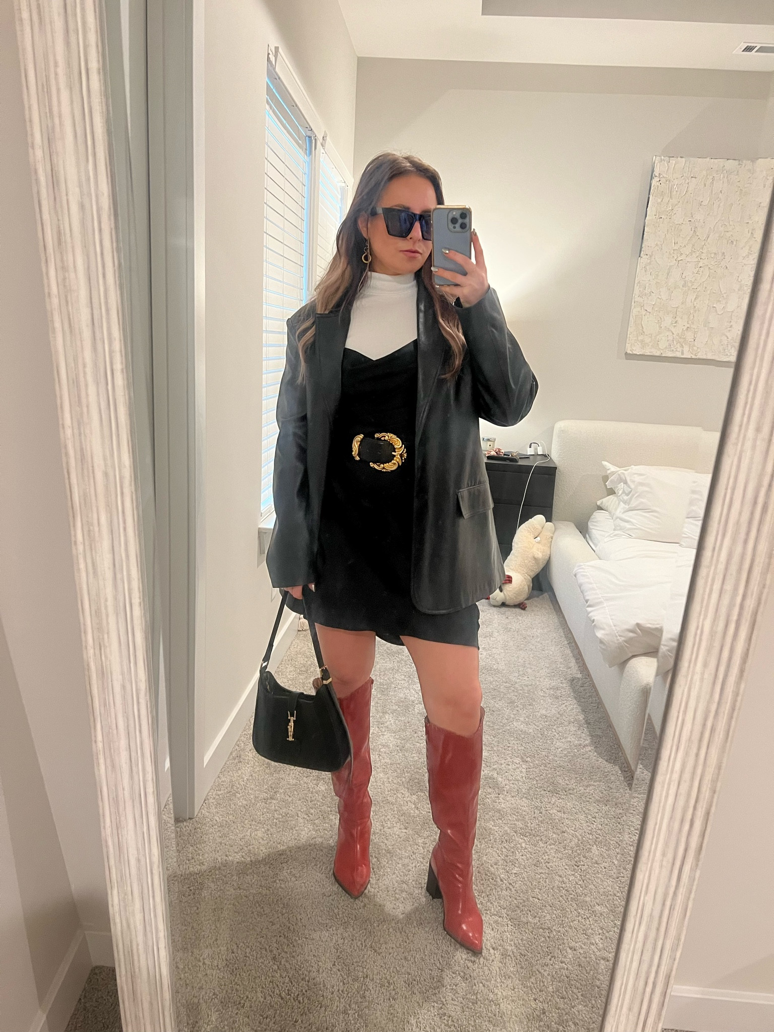 Black slip dress with white long sleeve shirt and a leather blazer 