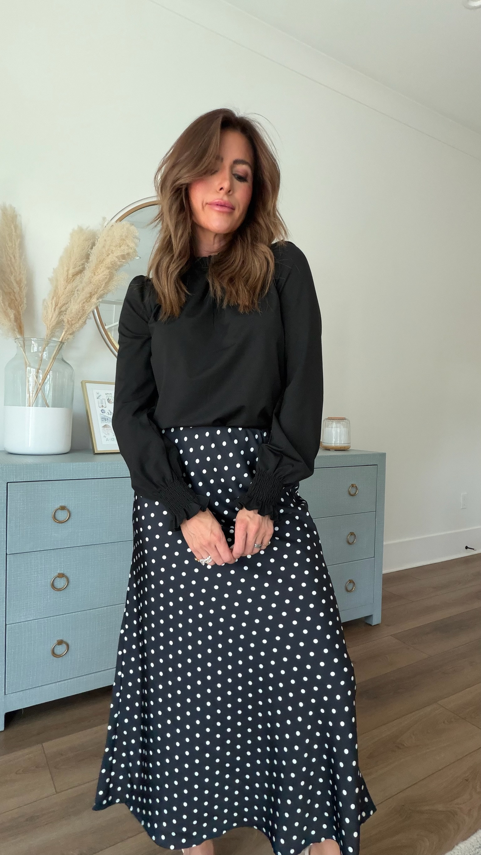 A polka dot maxi skirt paired with a classic black blouse for an effortlessly polished look.

polka dot skirt, maxi skirt, black blouse, fall outfit, early fall outfit, transitional outfit, classy outfit, feminine style, chic outfit, work outfit, dinner outfit, date night look, polished style, elegant outfit, black and white outfit, fall fashion, elevated casual, timeless style, office outfit, fall skirt outfit 

 #LTKootd #LTKOver40