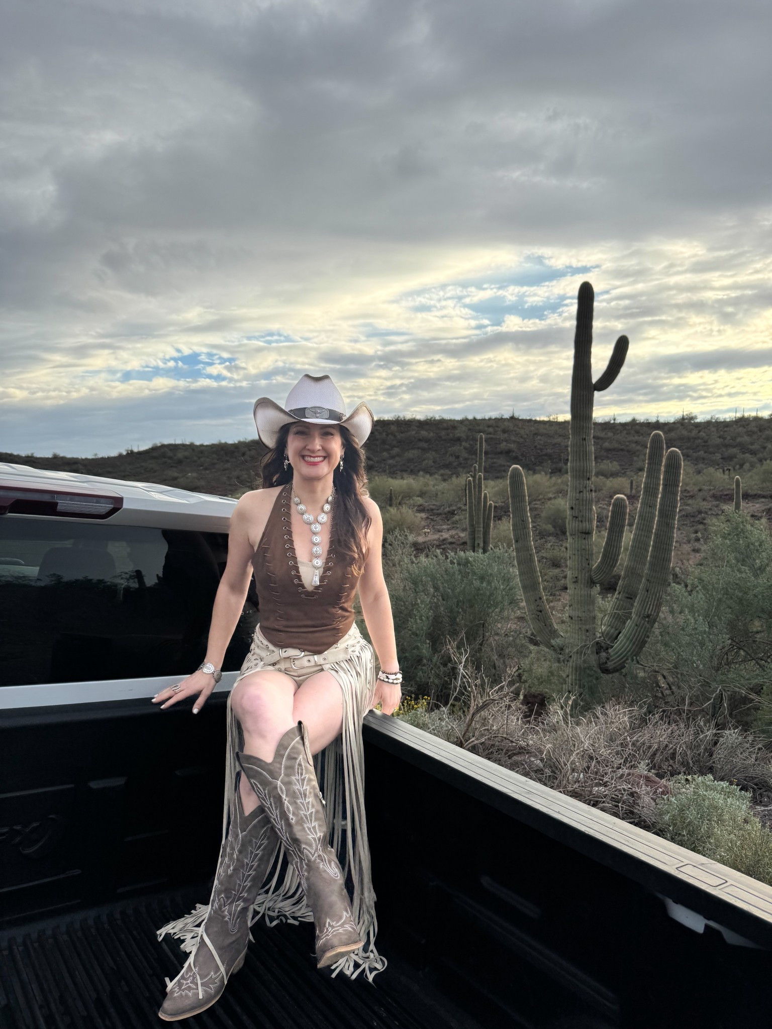 Country concert outfit, cowboy hat, cowboy boots, fringe shorts country western look 

#LTKBeauty #LTKgrwm #LTKPetite