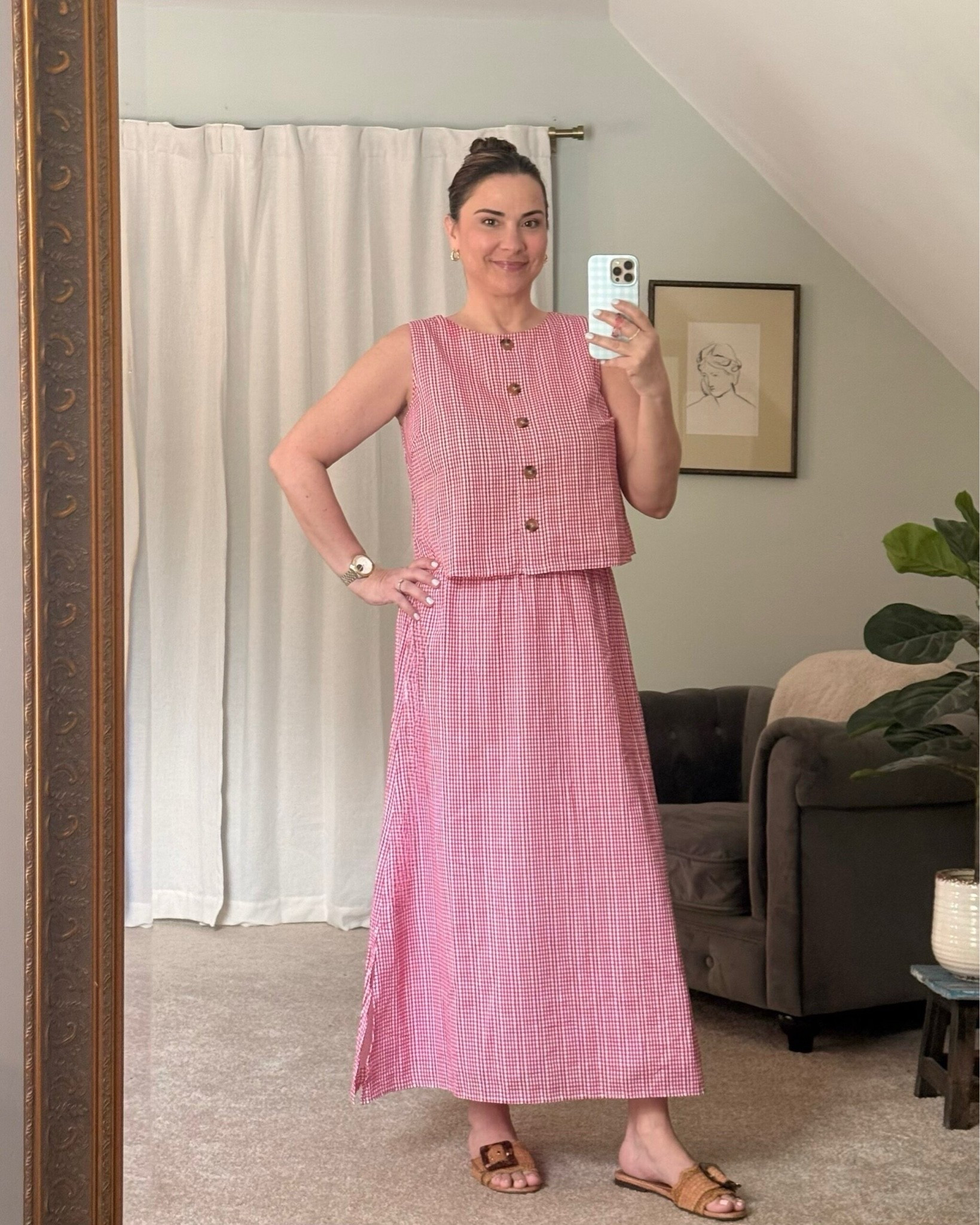 There’s something about red gingham in the summer ❤️

I wore this matching @Duffield Lane set on Sunday and immediately loved how easy it felt. The sleeveless top has the prettiest button details, and the midi skirt has pockets, an elastic back waistband, and enough movement to stay comfortable all day.

The fabric is lightweight cotton with a subtle stitched texture that gives it a little more personality than traditional gingham.

I can already tell I’ll be wearing these pieces together and separately all season long ☀️ 

Everything linked below ↓

#LTKOver40 #LTKootd #LTKSeasonal