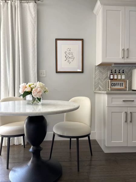 Pottery Barn kitchen table and chairs! This clean white look is great for a spring refresh of your dining area!

#LTKhome #LTKstyletip #LTKSeasonal