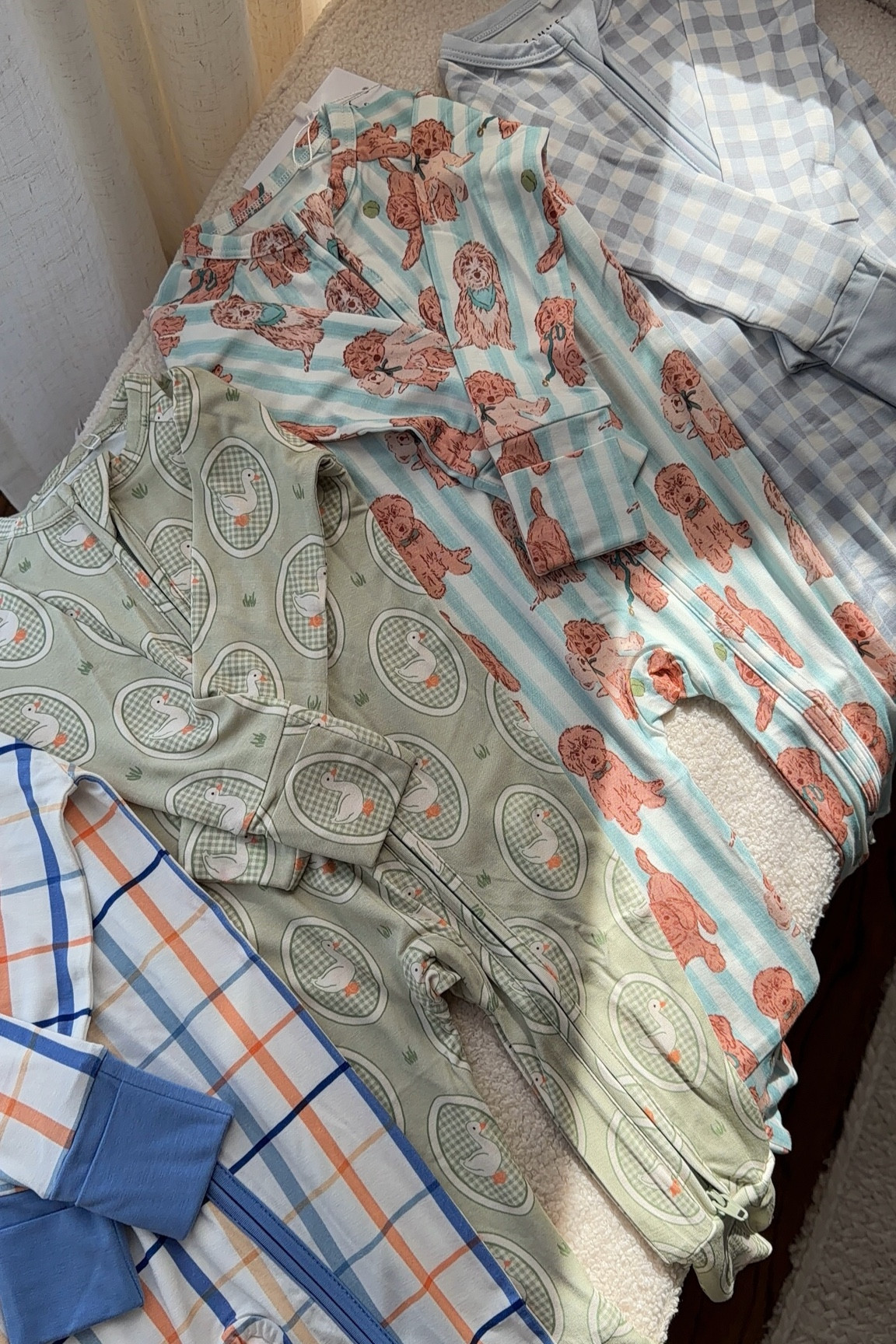 Bamboo pajamas
PJs
Baby onesies
Toddler sleepers 
Easter prints
Vintage goose
Gingham
Goldendoodles

#LTKmomlife #LTKKids #LTKBaby