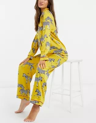 Chelsea Peers premium satin Zebra printed long revere pyjama set in mustard | ASOS (Global)
