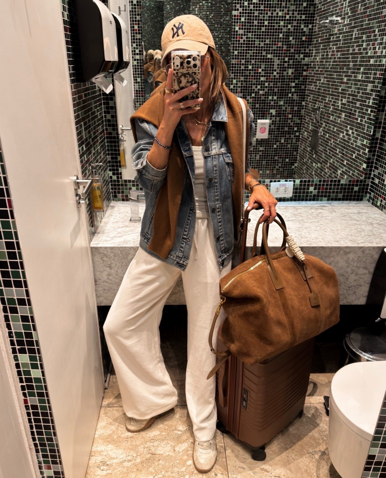Airport outfit, I’veworn these pants in two different international flights and they were just as nice looking at the end of the flight. Elastic waist, pockets and don’t touch the ground! Size small. Cashmere sweater and oversized denim jacket were a must also!
My suede duffel bag is the Percy travel bag, super roomy and easy to clean! 

#LTKootd #LTKSeasonal #LTKTravel
