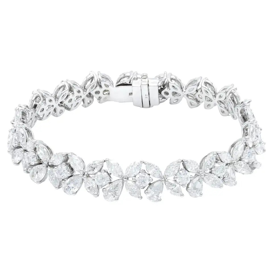 Diana M Platinum Fancy Multi-Shaped Diamond Cluster Bracelet Featuring 20.55 cts | 1stDibs