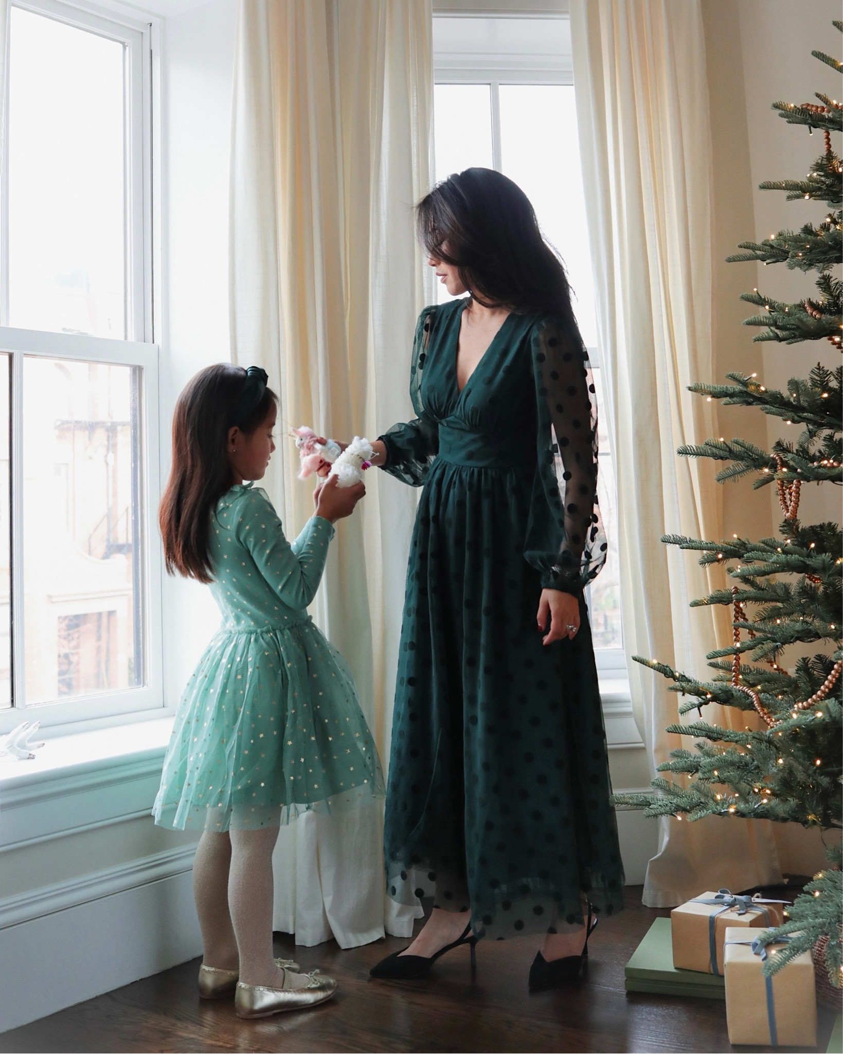 40% off boden kids this weekend with code N2Q8

For kids, if in between sizes i always size up. Nori is age 6 and wears their 6-7. 

On me:
• Boden Christine Tulle Midi Dress petite 0. Just posted a separate LTK video to show this better 

On Nori:
• Mini Boden Rose Twirly Tulle dress in eucalyptus gold stars 6-7y

• Girls leather ballet flats in gold metallic TTS

• girls nutcracker ballerina sweater 5-6 with tulle skirt

Ok Rio:
• Rio is in winter puffer coat size 3-4 and sweater size 4-5. Size up on this pullover sweater since it can be worn oversized! 

Ordered some Boden petite items to try after partnering on their kids line! This brand = nori’s dream wardrobe: whimsical, colorful and with fun little details. Also several mom & mini and sibling matching options! #bodenpartner

Holiday outfits, mother daughter, Christmas family photo outfits @mini_boden @boden_clothing
#LTKHoliday 

#LTKParties #LTKFamily