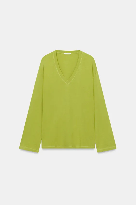Regular fit, V-neck, standard length, long sleeves. This T-shirt is crafted from premium cotton y... | Zara US