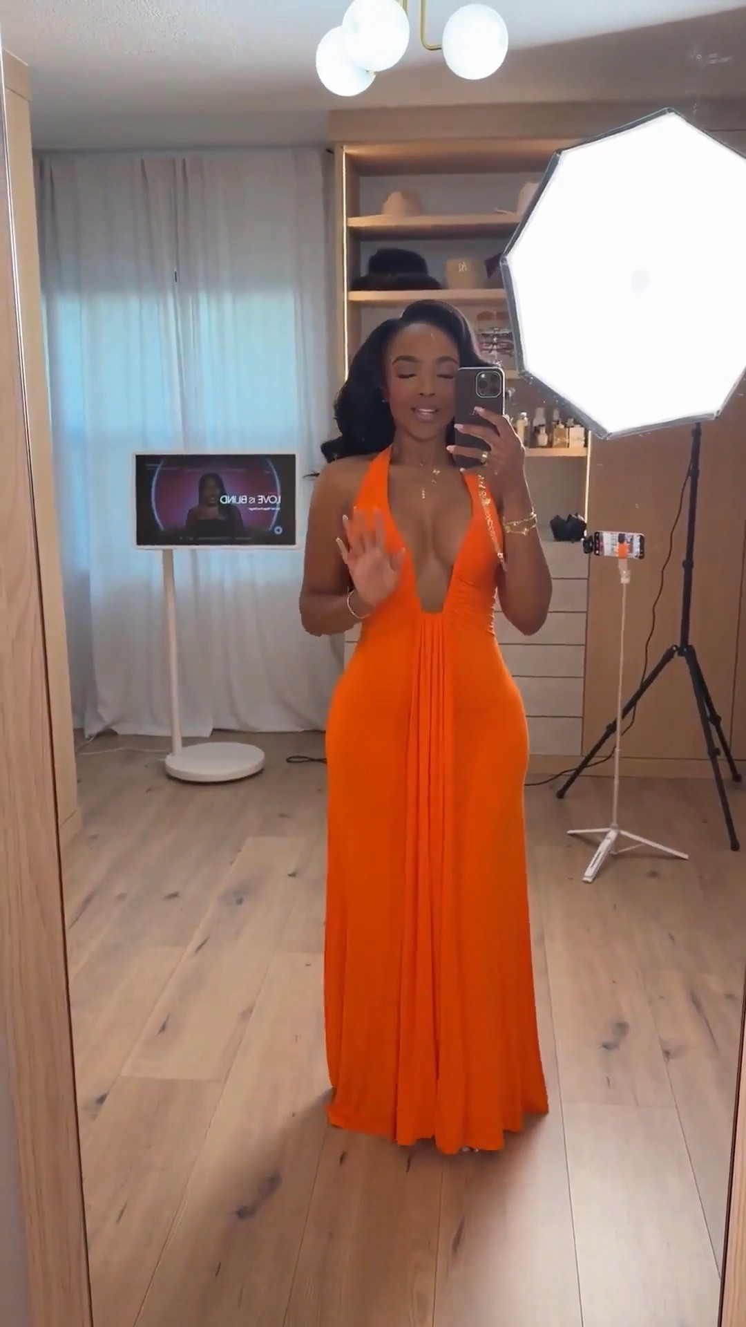 Scroll to shop! Bold orange dress perfect for summer weddings or as a vacation outfit! 

