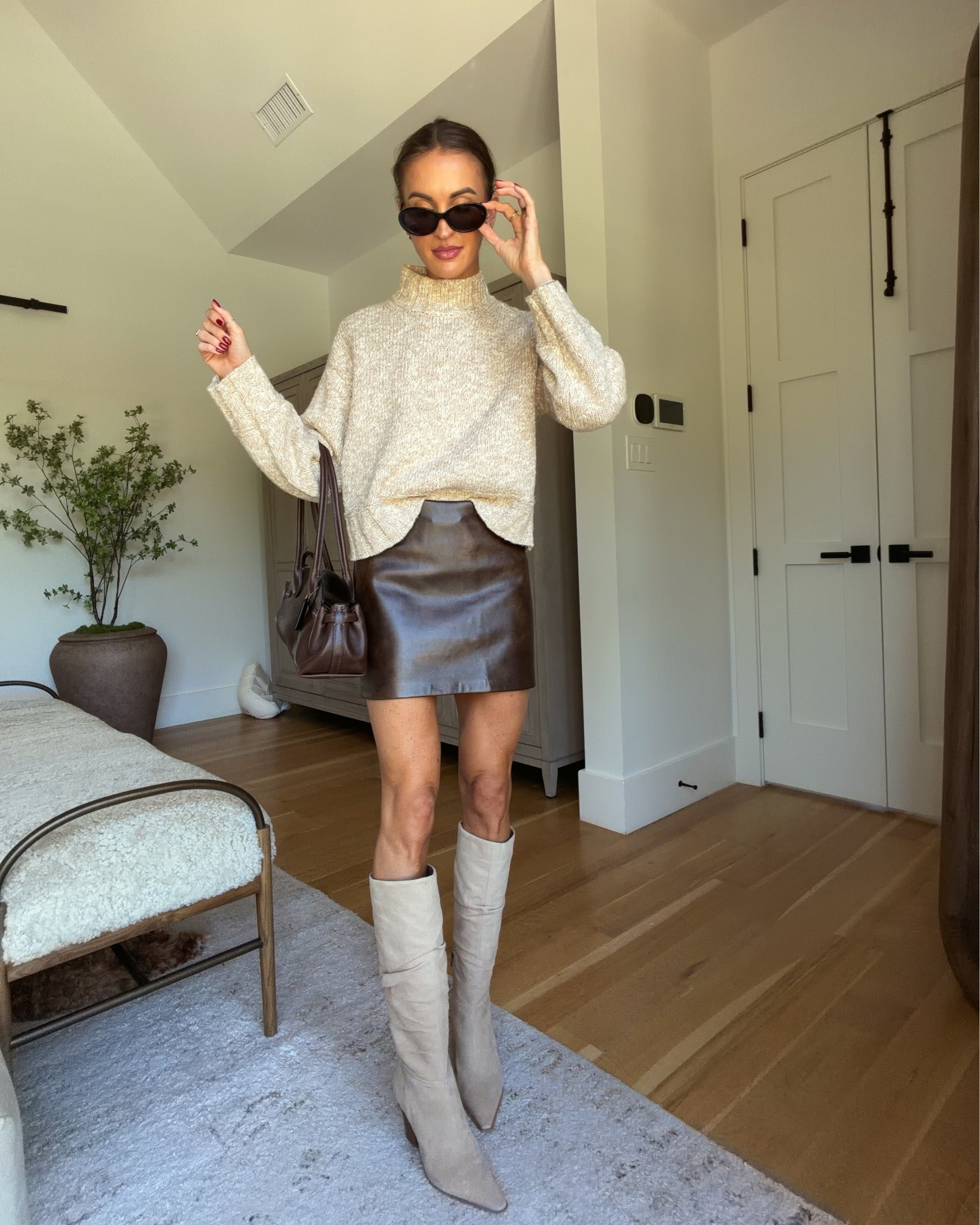 Fall outfit formula I’ll be repeating all season 🤎 this @abercrombie sweater is SO good! I love it paired with a leather mini skirt + knee high boots 
#abercrombiepartner