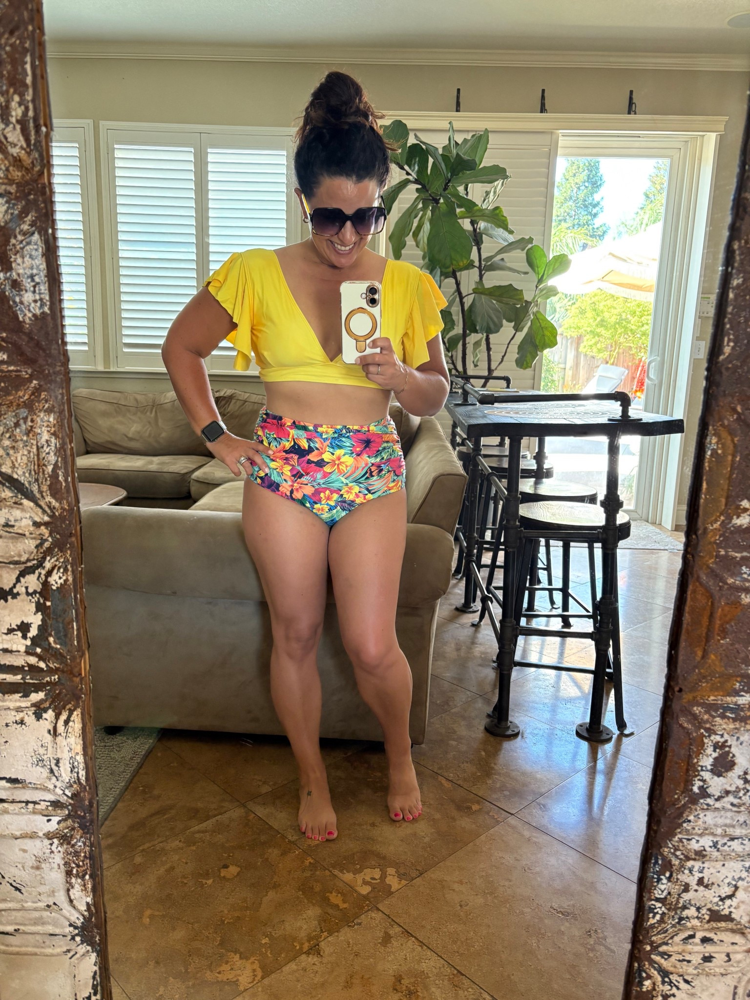 Spent the entire day at my daughter’s soccer tournament. It’s over 100° and time to relax in the pool in one of my favorite two piece swimsuits. This bikini is high waisted, has rouching on the sides, a flattering plunge neckline and cute flutter sleeves. I’ve had this suit for a few seasons and it has held up great, I am wearing a medium, but should have got a small. I’m a 34D and the top is a bit roomy on me. 

#LTKSwim #LTKOver40 #LTKTravel