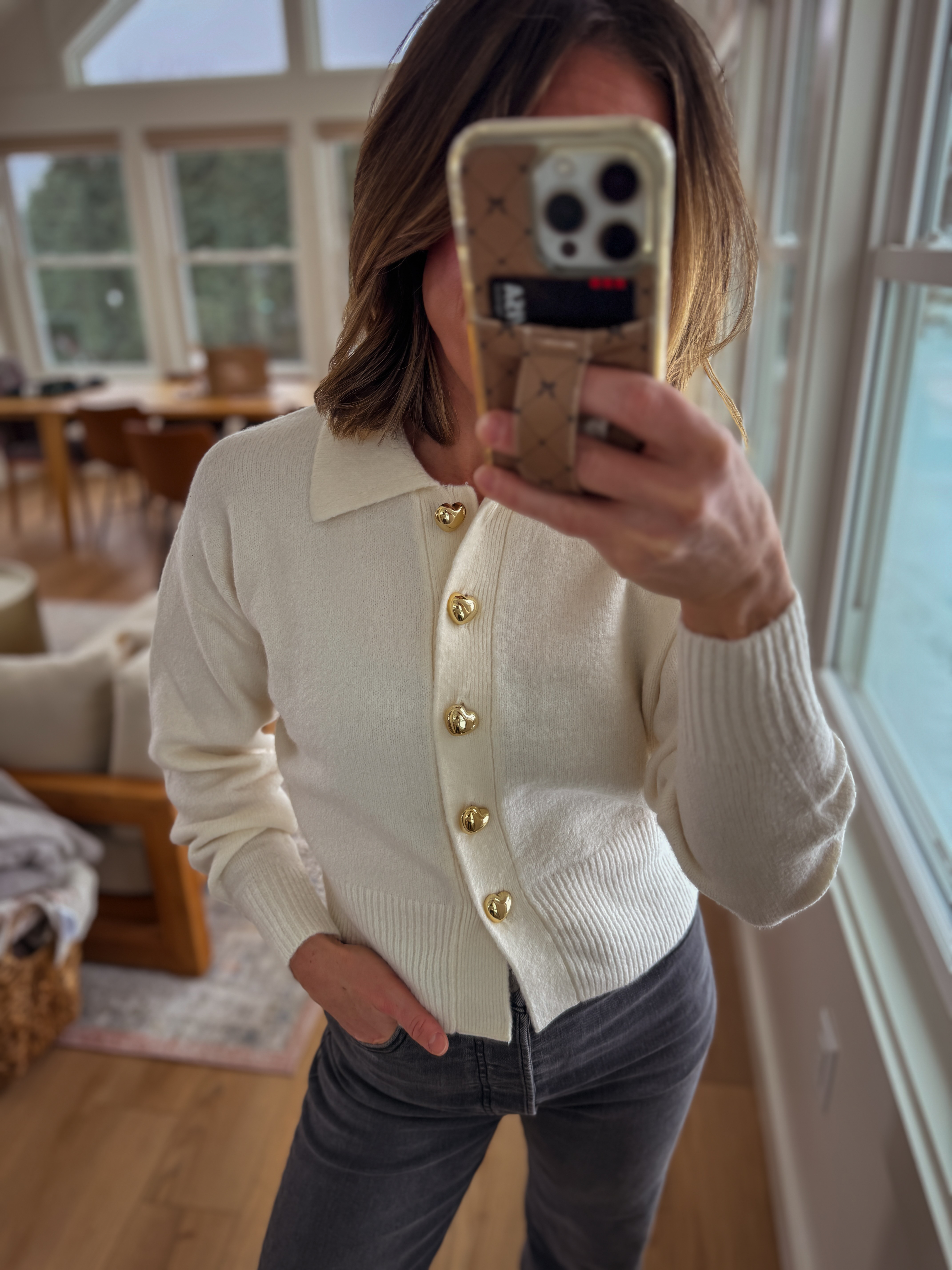 I love this Target sweater with the cute gold heart buttons.  

 #LTKHoliday #LTKOver40 #LTKPetite