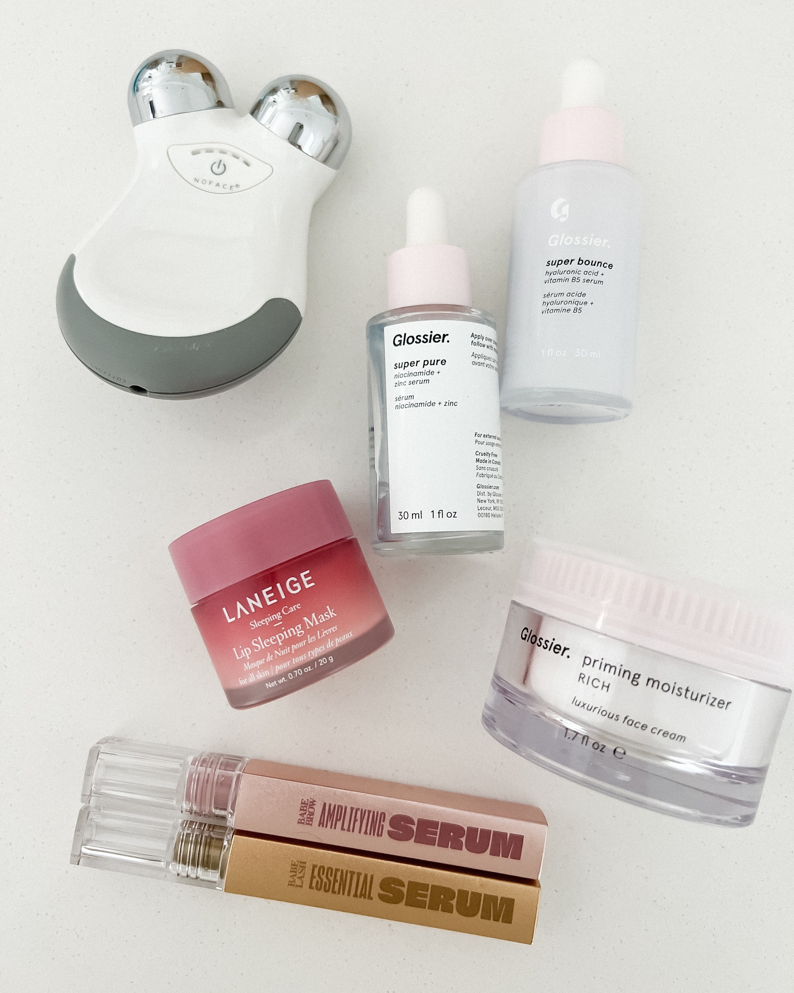 Some of my skincare faves: NuFace mini facial toning device, Glossier super pure serum, Glossier super bounce hyaluronic acid serum, Glossier moisturizer, Laneige lip mask, Babe lash & brow serum

#LTKbeauty #LTKFind #LTKunder100