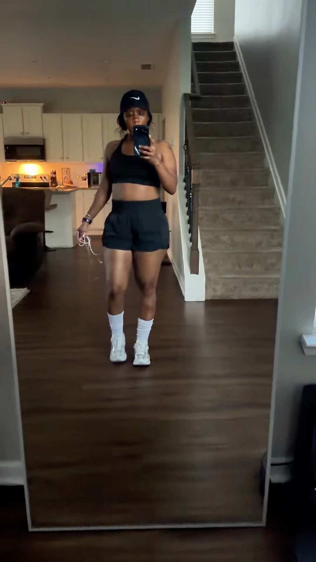 Getting ready to go for a walk and here’s  what I’m wearing… a black hat, black sports bra, and black running shorts. For sneakers, I’m wearing the Nike vomeros

#LTKootd #LTKActive #LTKOver40