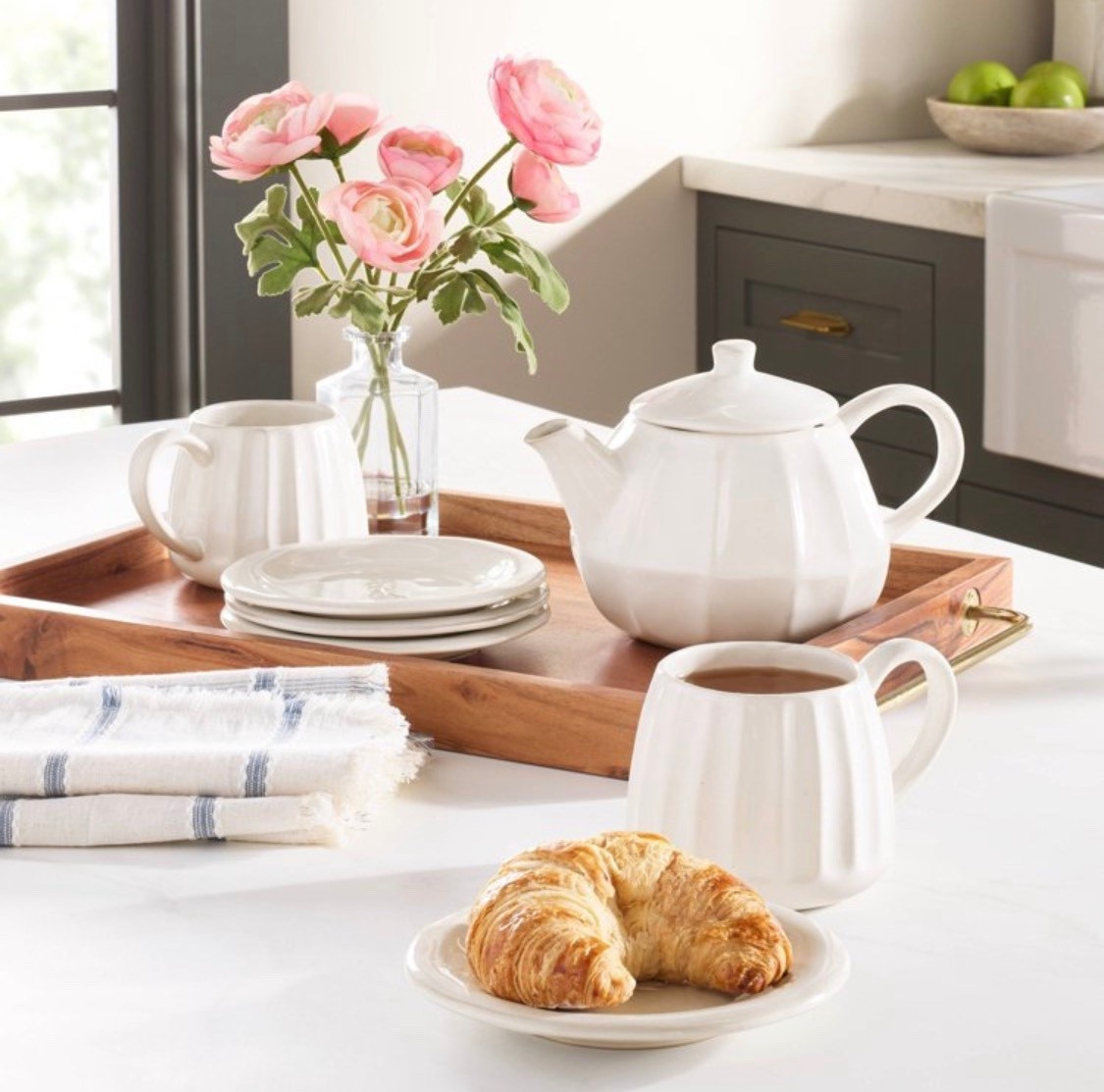 Enhance your home decor with the lovely look of this Small Ranunculus Artificial Flower Arrangement from Hearth & Hand™ with Magnolia. This artificial arrangement features multiple green stems with pink faux ranunculus flowers housed in a transparent glass vase for a gorgeous look. Suitable for indoor use only, you can place it on any flat surface along with other potted stems for a welcoming display

#LTKValentine #LTKHome #LTKSeasonal