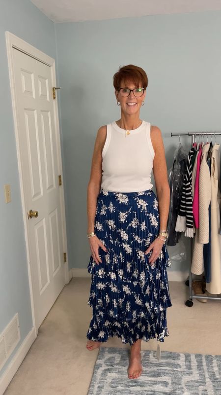 Abercrombie try on
Blue floral pleated satin tiered maxi skirt paired with a white ribbed fitted tank from Banana Republic 
Wearing a medium tall in the skirt and a medium in the tank

Over 50 fashion, tall fashion, workwear, everyday, timeless, Classic Outfits

Hi I’m Suzanne from A Tall Drink of Style - I am 6’1”. I have a 36” inseam. I wear a medium in most tops, an 8 or a 10 in most bottoms, an 8 in most dresses, and a size 9 shoe. 

fashion for women over 50, tall fashion, smart casual, work outfit, workwear, timeless classic outfits, timeless classic style, classic fashion, jeans, date night outfit, dress, spring outfit

#LTKover40 #LTKstyletip #LTKworkwear