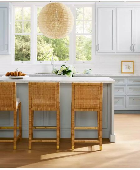 The rattan woven bar stools with brass accents bring in coastal chic and glam to this kitchen island 


#LTKsalealert #LTKHoliday #LTKhome