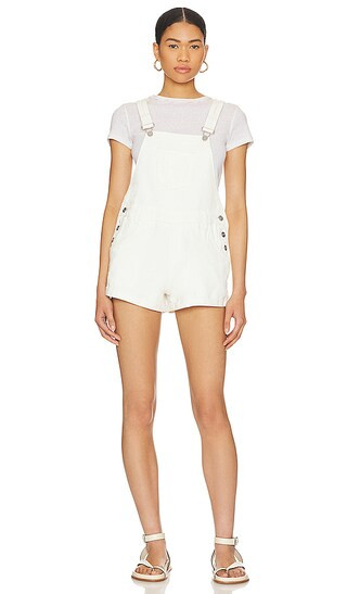 Meghan Distressed Short Overalls in Bone | Revolve Clothing (Global)