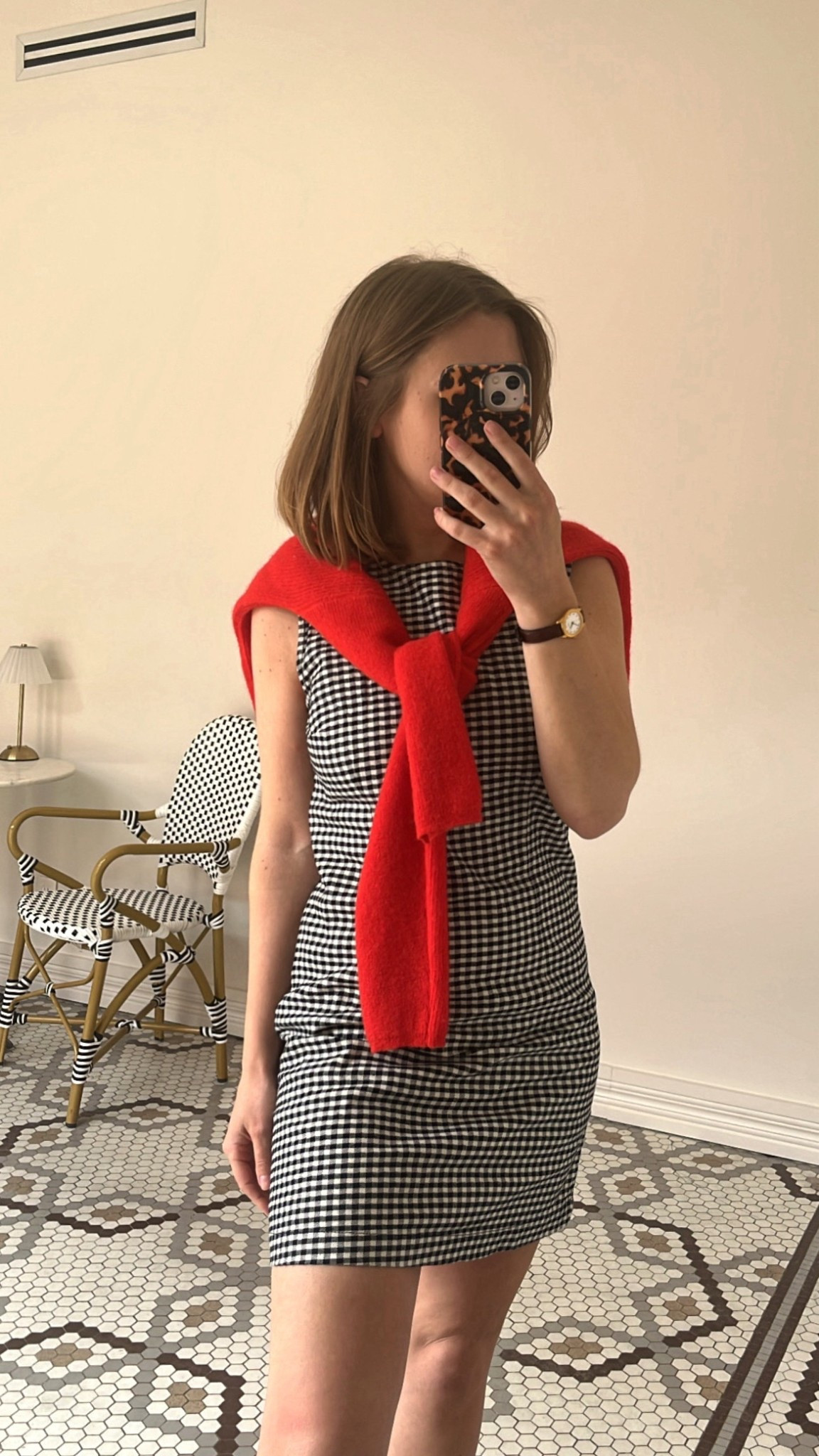 I love how gingham is trending right now! This is the mini dress from the recent GapxDoen collab, which is perfect for summer. I paired it with a Sezane Barry sweater over my shoulders, and a leather watch for a preppy vibe.
-Cassie, MCO Content Coordinator

#LTKStyleTip #LTKSeasonal