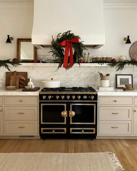 Kat Jamieson of With Love From Kat shares her kitchen decorated for Christmas. Wreath, holiday decor, stove, home. 

#LTKhome #LTKHoliday