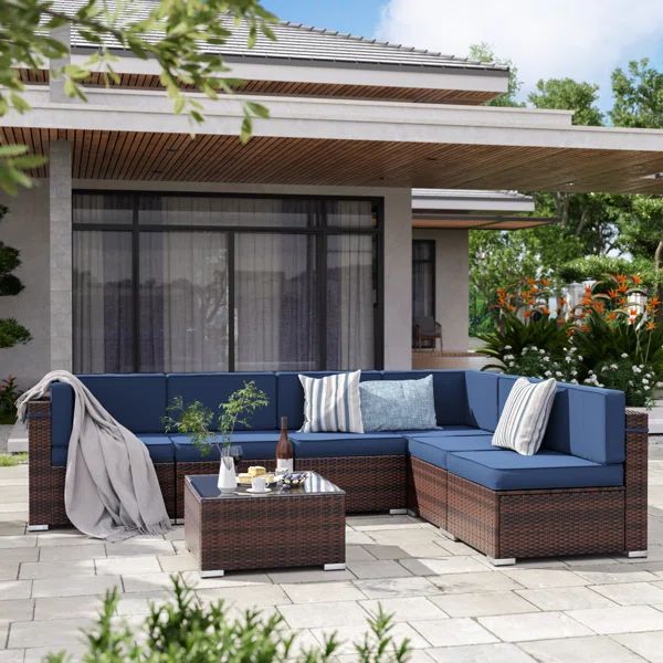 7 Piece Rattan Sectional Seating Group with Cushions | Wayfair North America