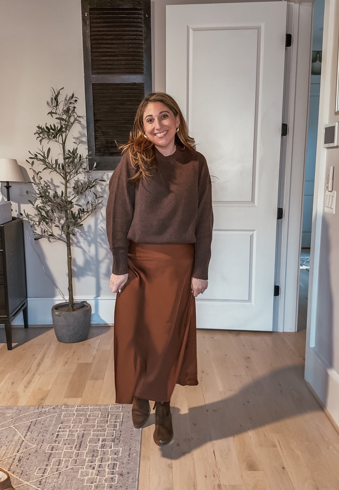 Chocolate brown monochromatic outfit anyone?? Because I don’t know about you but I’m in love!! Also, I need to mention that believe it or not, this outfit was as comfortable as my pajamas! 
Sweater L / Slip skirt L / Booties tts 

#LTKHoliday #LTKMidsize #LTKParties