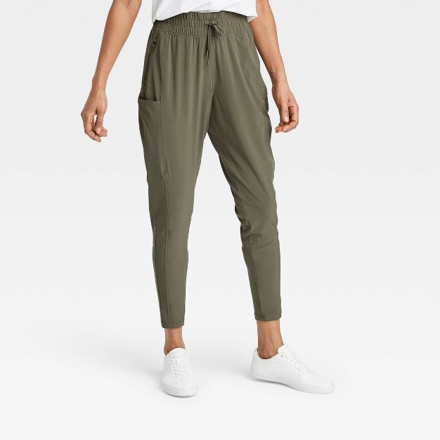 Women's Tapered Stretch Woven Mid-Rise Pants - All in Motion™ | Target
