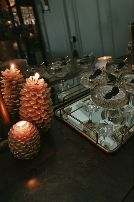 Pinecone holiday candle, mirrored glass tray, coupe glasses ❤️

#LTKSeasonal #LTKHoliday #LTKsalealert
