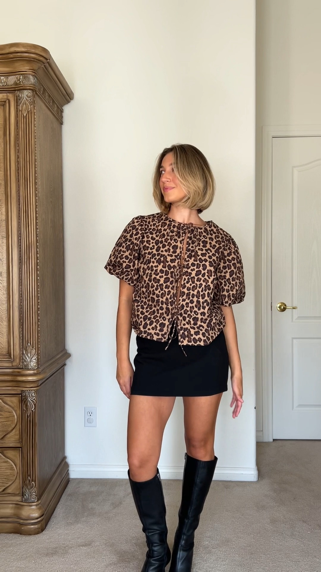 Fall outfit, fall style, cheetah top, cheetah, tie top, cheetah blouse, black skirt, mini skirt, black mini skirt, black boots, knee high boots

#LTKSeasonal #LTKStyleTip #LTKVideo