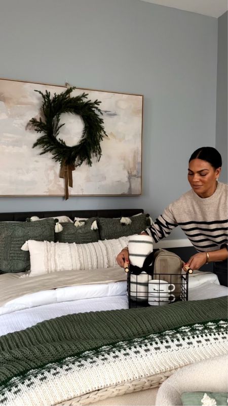 Guest room is Christmas ready! 🌲✨ #TargetPartner #ad Do you add a little bit of holiday cheer to every room, too? I love to add special touches.
Here are some ways to make the guest room feel holiday cozy:
-Start with a good foundation: I use a fluffy mattress pad and good sheets. With every layer I spray my homemade linen spray- everyone loves the smell- so fresh and relaxing and it’s even naturally antibacterial!
-Lots of layers: I don’t stop at the bed pillows and a weighty comforter- I add throw pillows (these had some holiday cheer!) and lots of blankets. The more the merrier- here I used a lighter waffle knit, chunky knit, and a Christmas-y tasseled throw!
-Chair: I think adding a chair rounds it out, giving you another opportunity for a cozy throw and pillow!
-Leave a gift: I used a basket filled with toiletries including a few of my faves, and some mugs.
-All in the details: in addition to an easy to reach, dimmable lamp, I added candles and lots of faux greenery, including a wreath for some more Christmas cheer!
Everything’s from @Target and in my LTK! #TargetStyle

#LTKhome #LTKHoliday #LTKover40