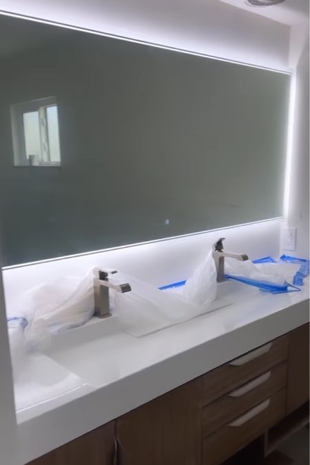 Light up mirror in guest bathroom 