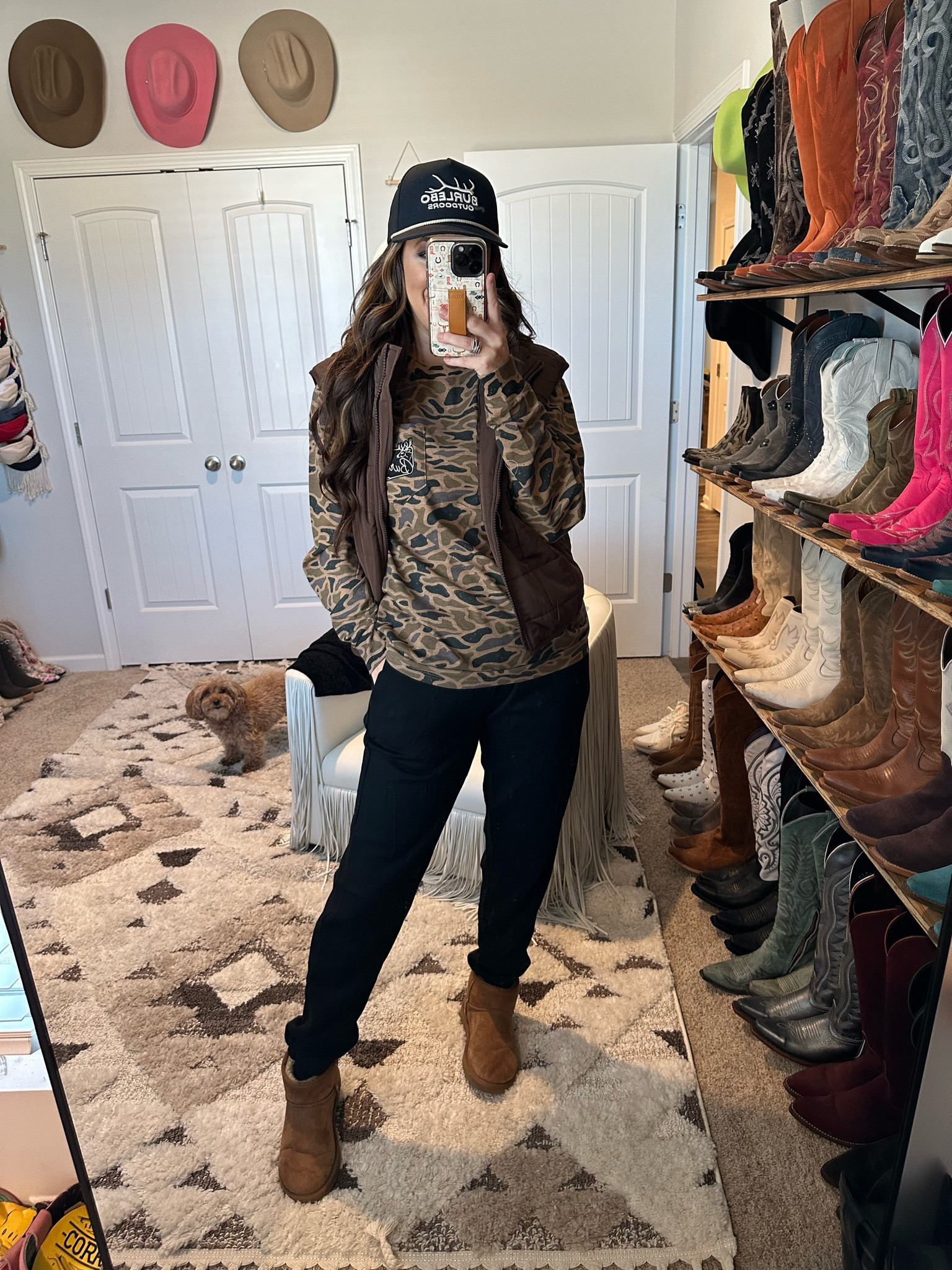 Casual camouflage outfit idea for fall winter for women styling a chocolate brown puffer vest with black sweatpants and UGG boots


#LTKxPrimeDay #LTKStyleTip #LTKFindsUnder50