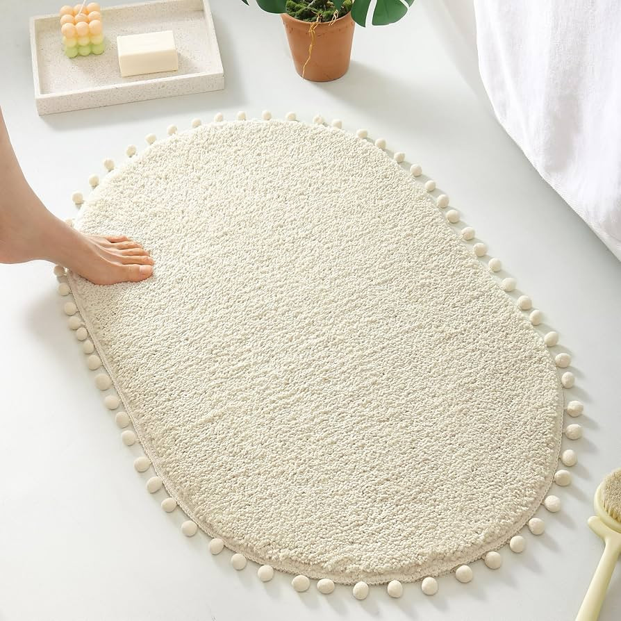 YIRDDEO Oval Bathroom Rugs Beige Rug with Pom Cream Bath Mat for Bedroom Non Slip Cute Boho Absor... | Amazon (US)