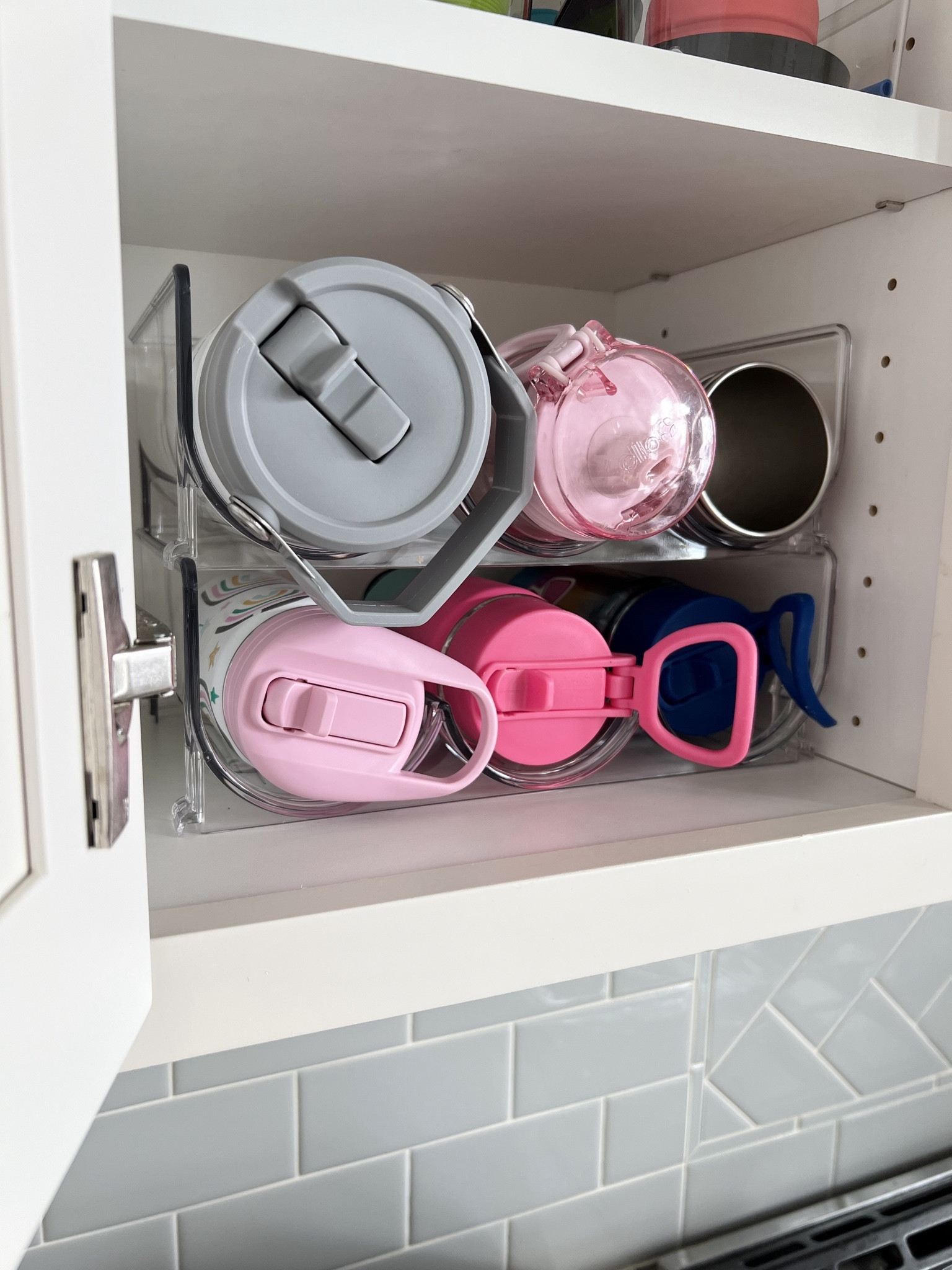 So happy these stackable bottle organizers arrived from Amazon! This is the set of 2. I included our favorite kid water bottle and stainless steel cups.

Kitchen organizer | bottle holder

#LTKhome #LTKfamily #LTKfindsunder50
