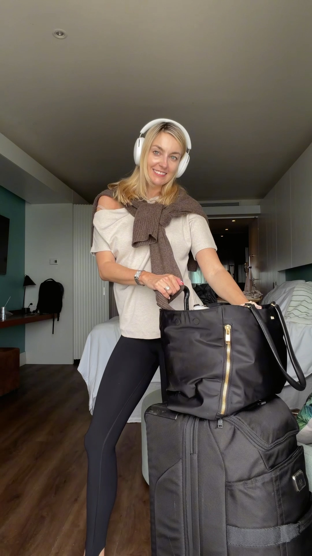 This airport outfit formula worked way better than I expected — especially flying from hot weather into freezing temps.
First time wearing leggings on the plane and I loved it.

Travel outfit • airplane outfit • stirrup leggings • vacation outfit • cashmere sweater • travel look • brown sweater • spring break • vacation outfit 

#LTKootd #LTKTravel #LTKvlog