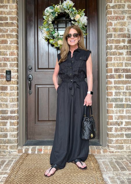 Fabulous black linen blend jumpsuit. I'm wearing size XS regular, but probably should've ordered a petite length. This is a great one to dress up or down. Here I just paired it with Tory Burch sandals for a casual day outfit.

#classylook #monochromestyle #allblackoutfit #transitionalstyle

#LTKStyleTip #LTKItBag #LTKSeasonal