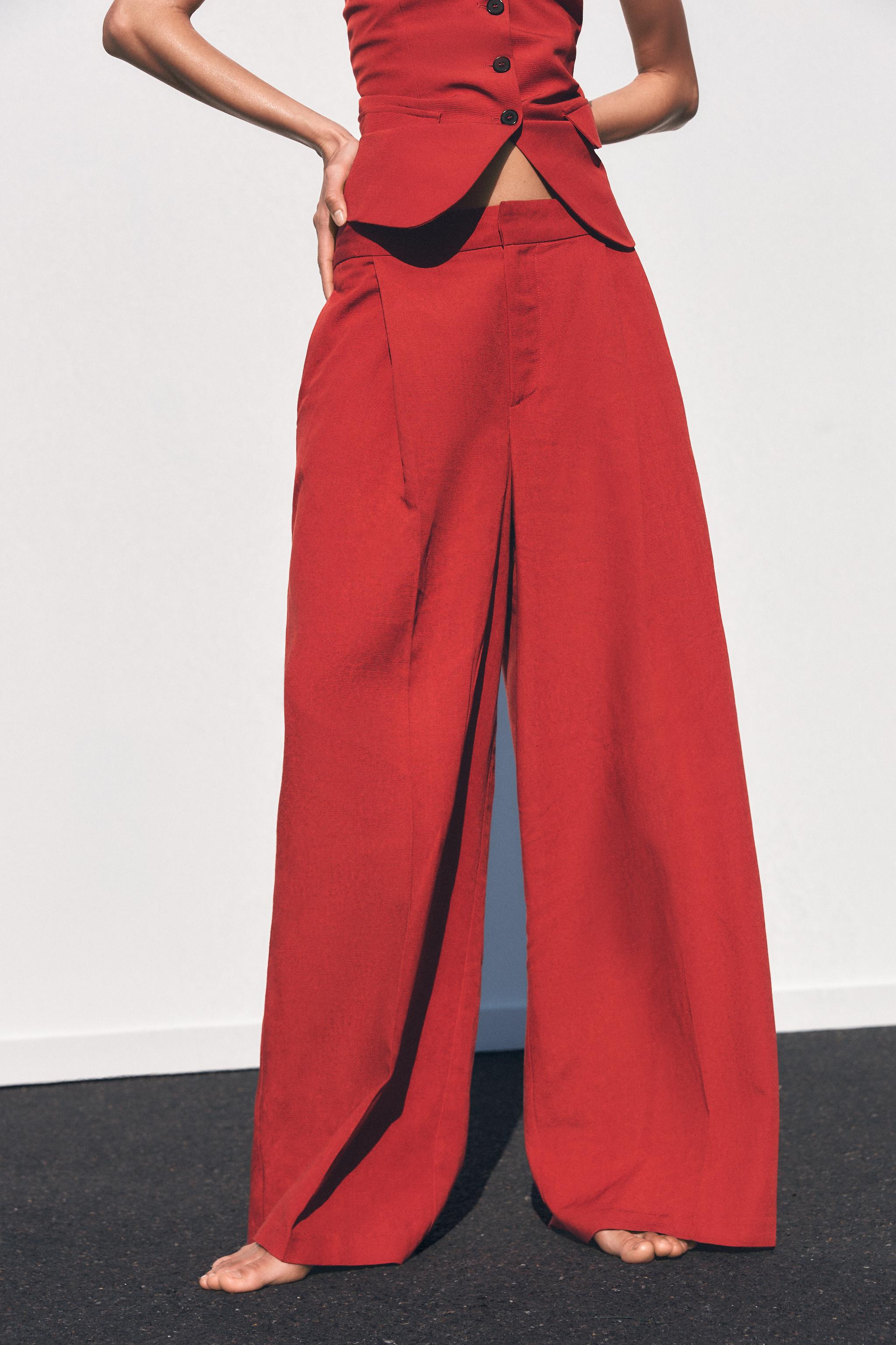 High-waisted pants with belt loops. Double pleat detail. Side pockets and back false welt pockets... | Zara US