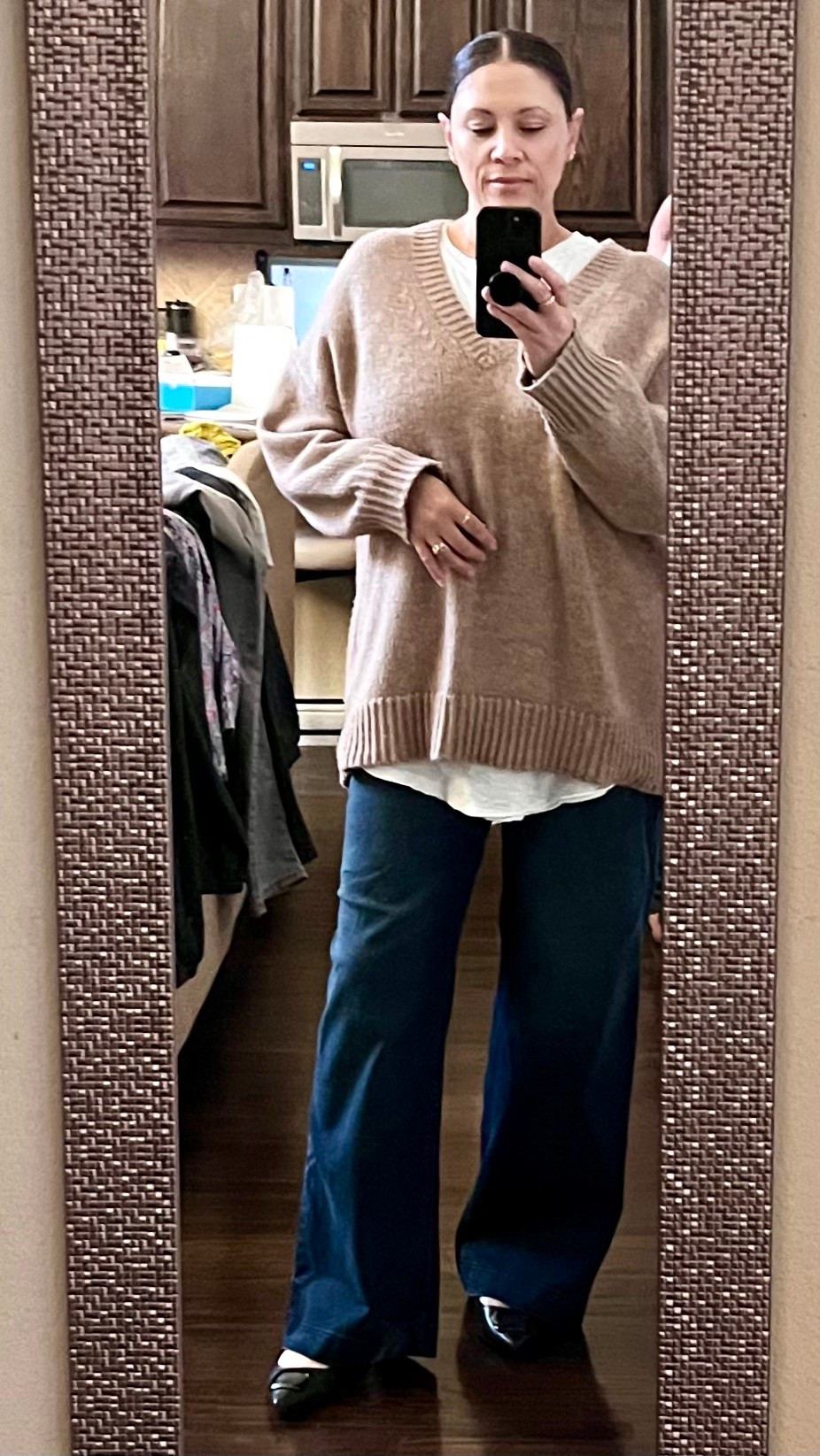 At this point, the kids’ clothes on the back of my sofa are decoration! 😆 This is my casual office outfit today.  I’m back in office 3 days a week. I’ve lost some weight so this oversized sweater is extra oversized but I love how cozy it is.

#LTKMidsize #LTKdayinmylife #LTKmomlife