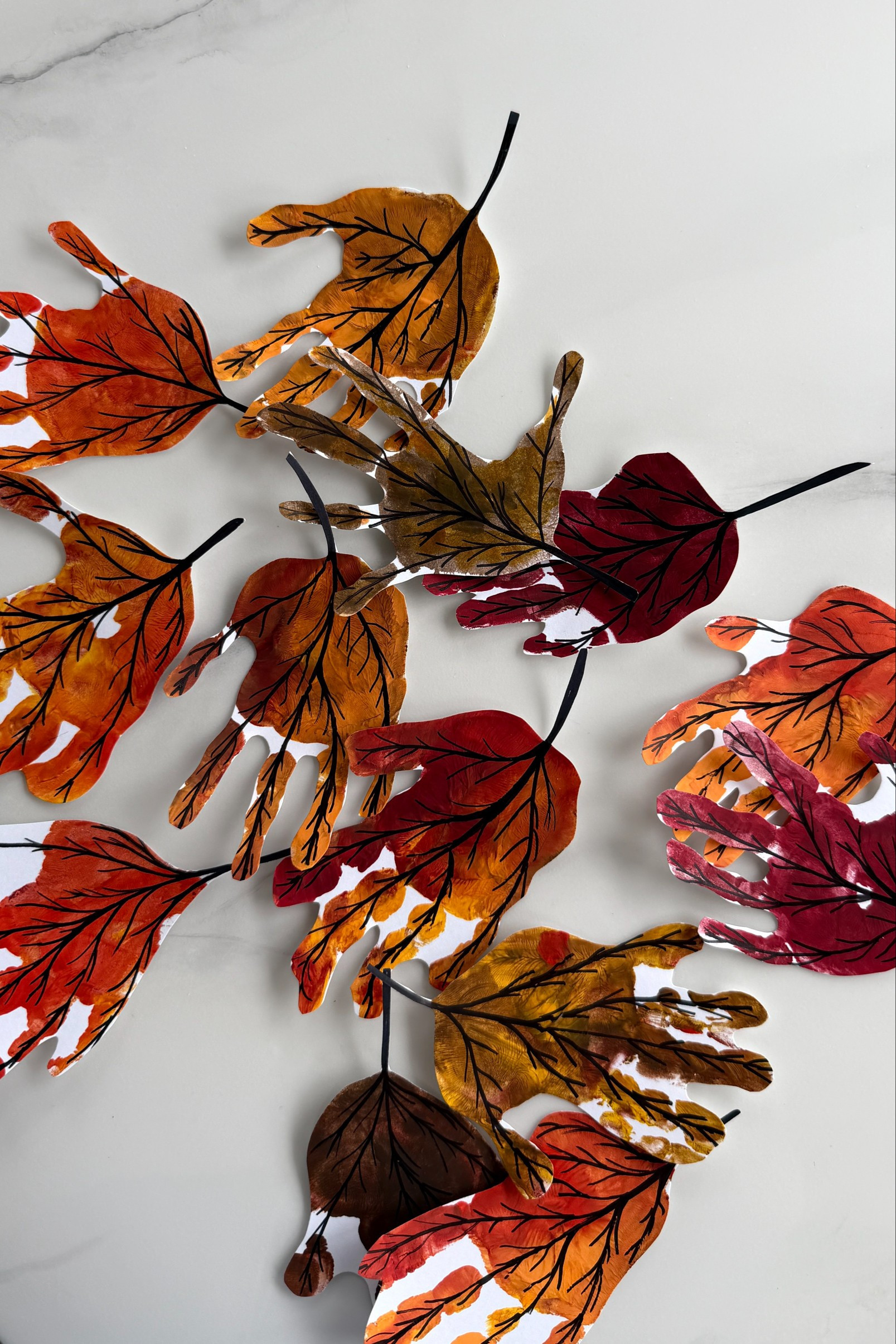 Here’s a good fall pic you can put anywhere. Hand-print leaves! The perfect toddler craft for fall! I’m turning mine into a garland, but you could also make a wreath!

#LTKmomlife #LTKHome